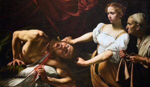 locandina di Caravaggio e Artemisia in mostra a Roma al Palazzo Barberini: la sfida di Giuditta